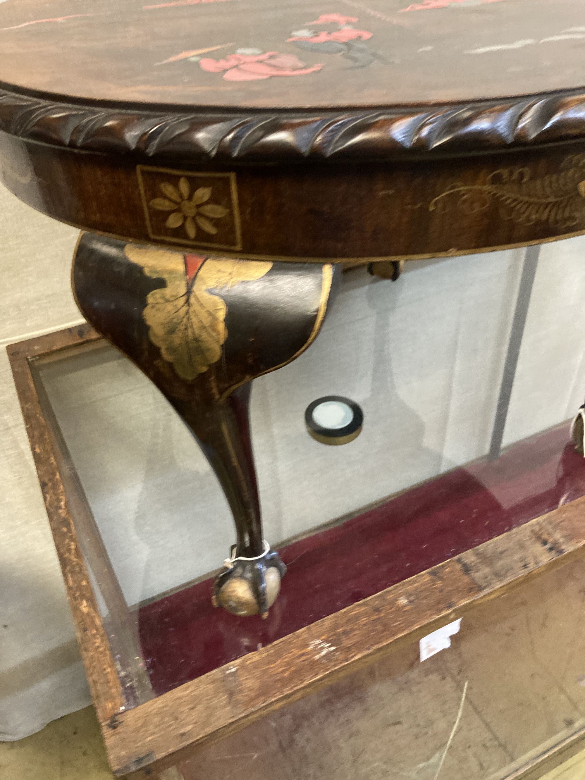 A circular chinoiserie low occasional table, diameter 60cm, height 41cm